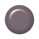 Swatch of IBD Patchwork – dusty purple-grey gel polish with a smooth cream texture and subtle elegance.
